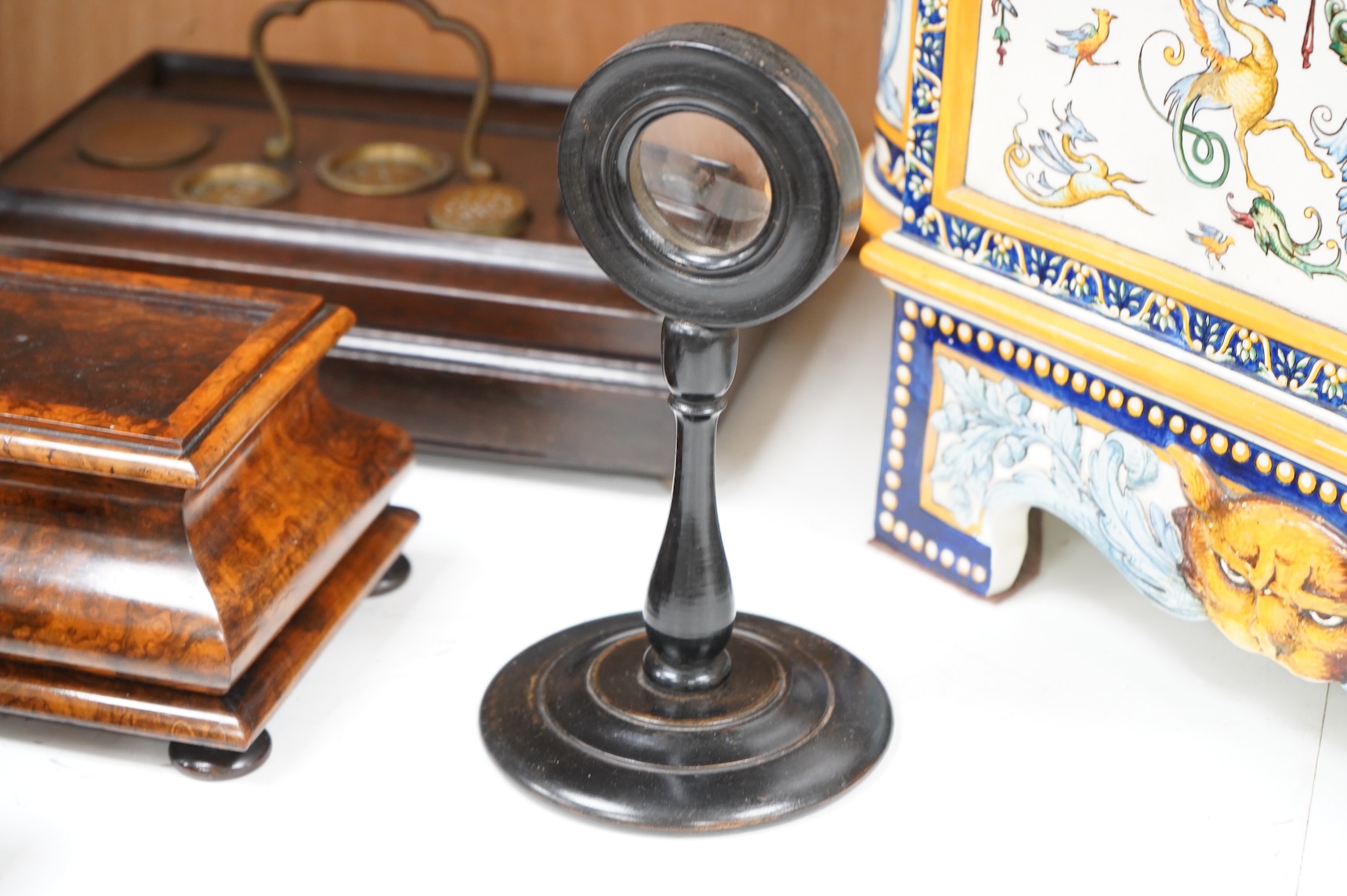A collection of sundry items to include a Coromandel and brass mounted ink blotter pad, an early 19th century French yew veneered travelling writing box, an early 19th century mahogany desk stand and burr walnut bombé sh